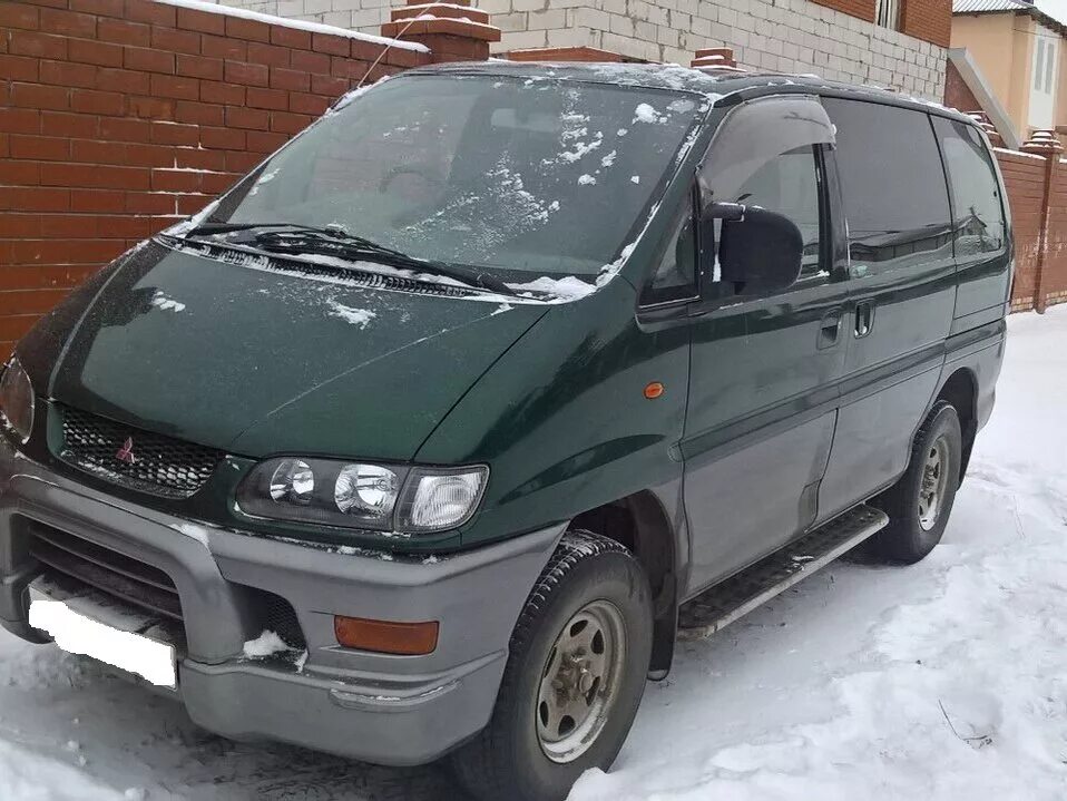 Мицубиси дизель бу. Mitsubishi Delica 1998. Митсубиси Делика 1998г. Митсубиси минивэн 1998. Делика 4 WD дизель.