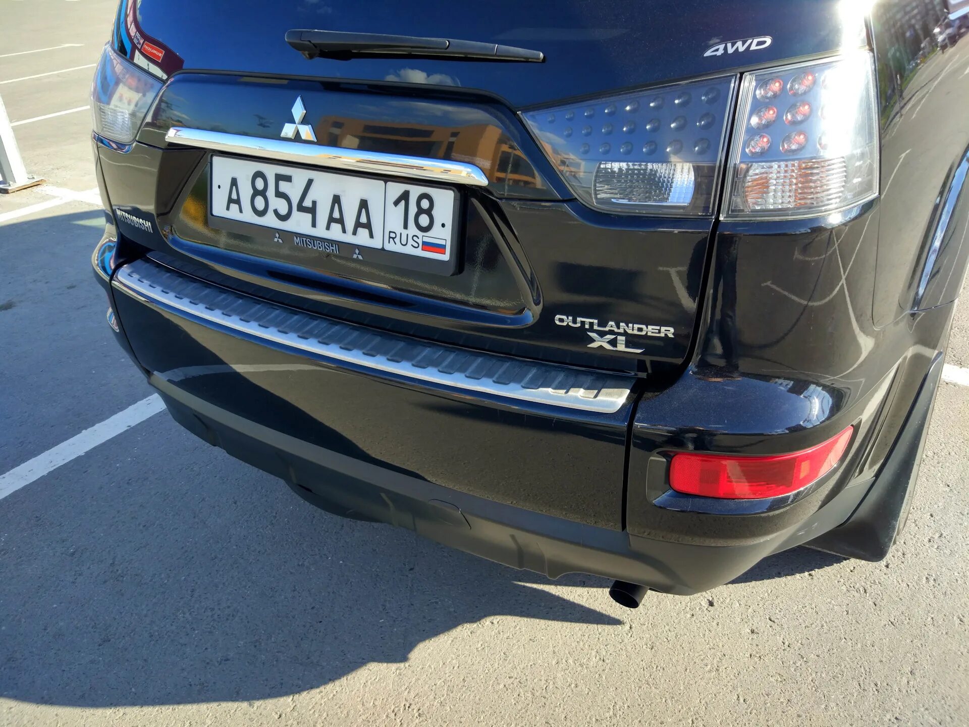 Задний бампер мицубиси аутлендер. Накладка заднего бампера mitsubishi outlander xl. накладка на бампер mitsubishi outlander xl. накладка на задний бампер митсубиси аутлендер xl 2008. накладка на бампер аутлендер 3.
