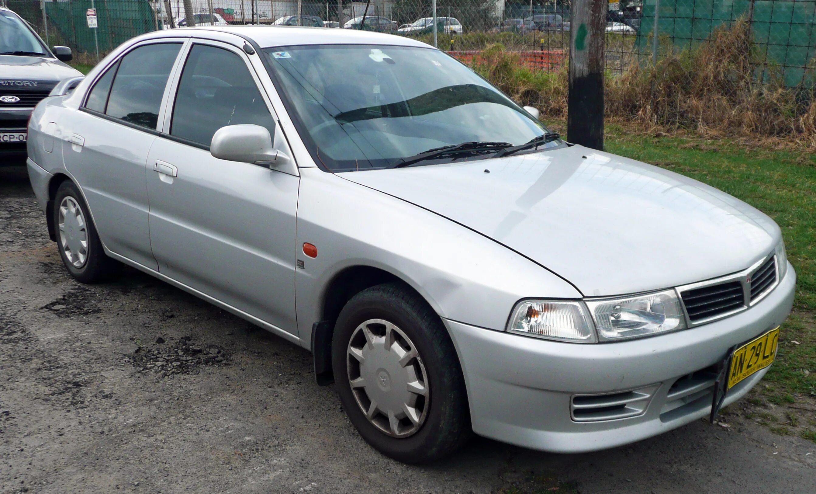 Митсубиси лансер 1999 года. Mitsubishi lancer 2001. митсубиси лансер 2001. lancer 6 1999. митсубиси лансер 1999.