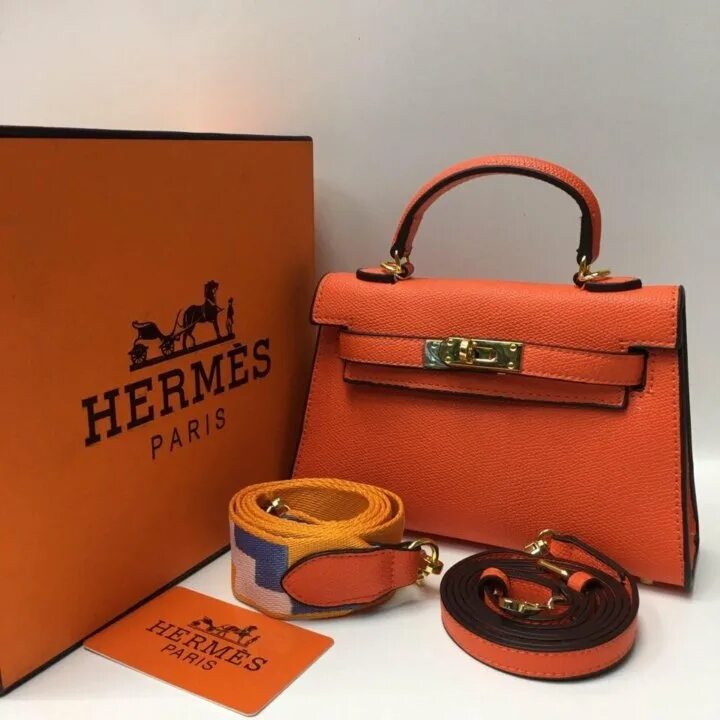 Гермес интернет магазин. Hermes сумки логотип. Hermes фирменный цвет. Дорожная сумка Hermes.