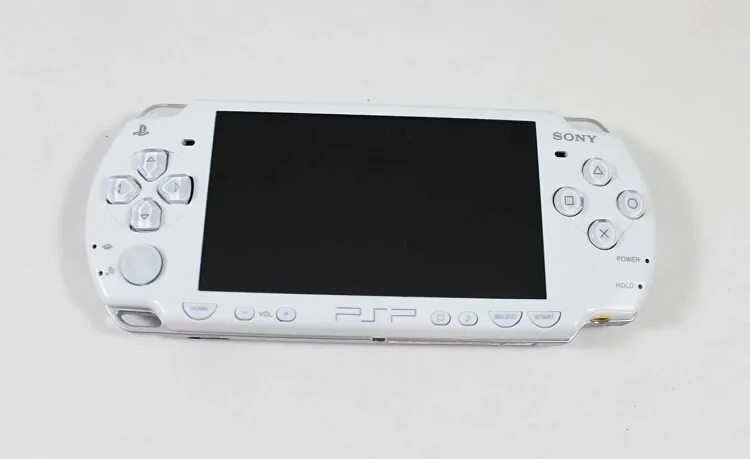 Игры белая приставка. Сони белая PSP 2000. PSP Ceramic White. Белая консоль приставка. Игровые приставки 2000.