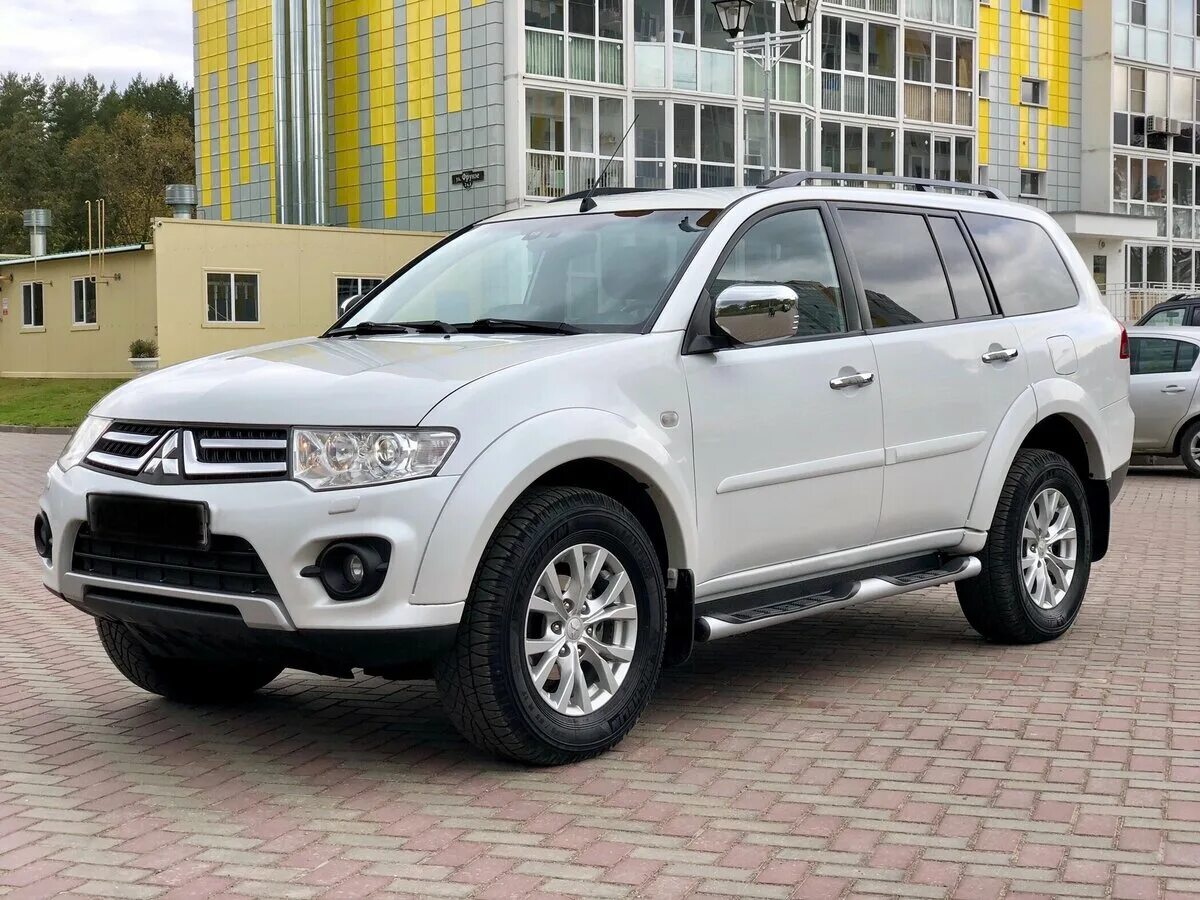 Mitsubishi Pajero Sport 2008. Мицубиси Паджеро спорт 2014 года. Мицубиси Паджеро спорт 2014 года белый. Mitsubishi Pajero Sport белый.