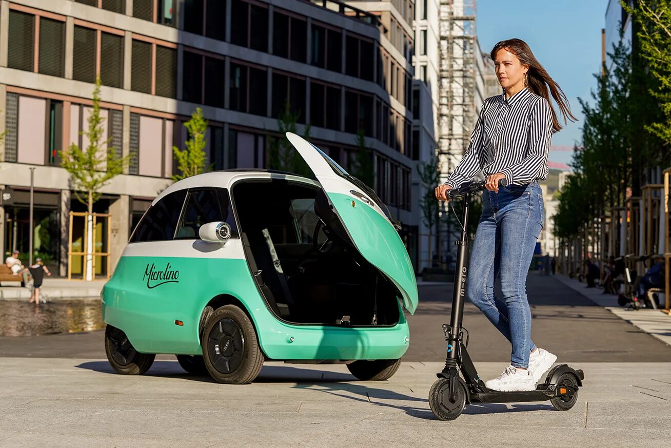 E micro. Microlino e-car. micro scooter. micro mobility. самокат микролино.