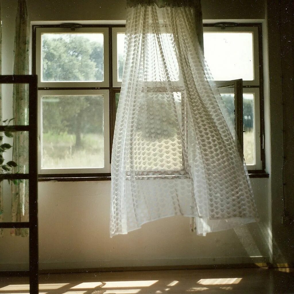 There are curtains on the window