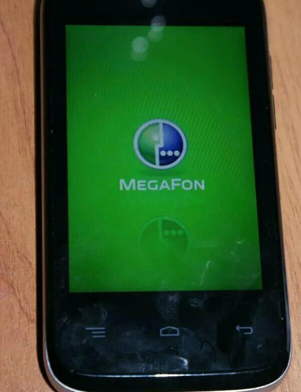 Мобильный телефон megafon login 2. Смартфон МЕГАФОН login 1. Megafon login 2 смартфон. Megafon login 2 телефон.