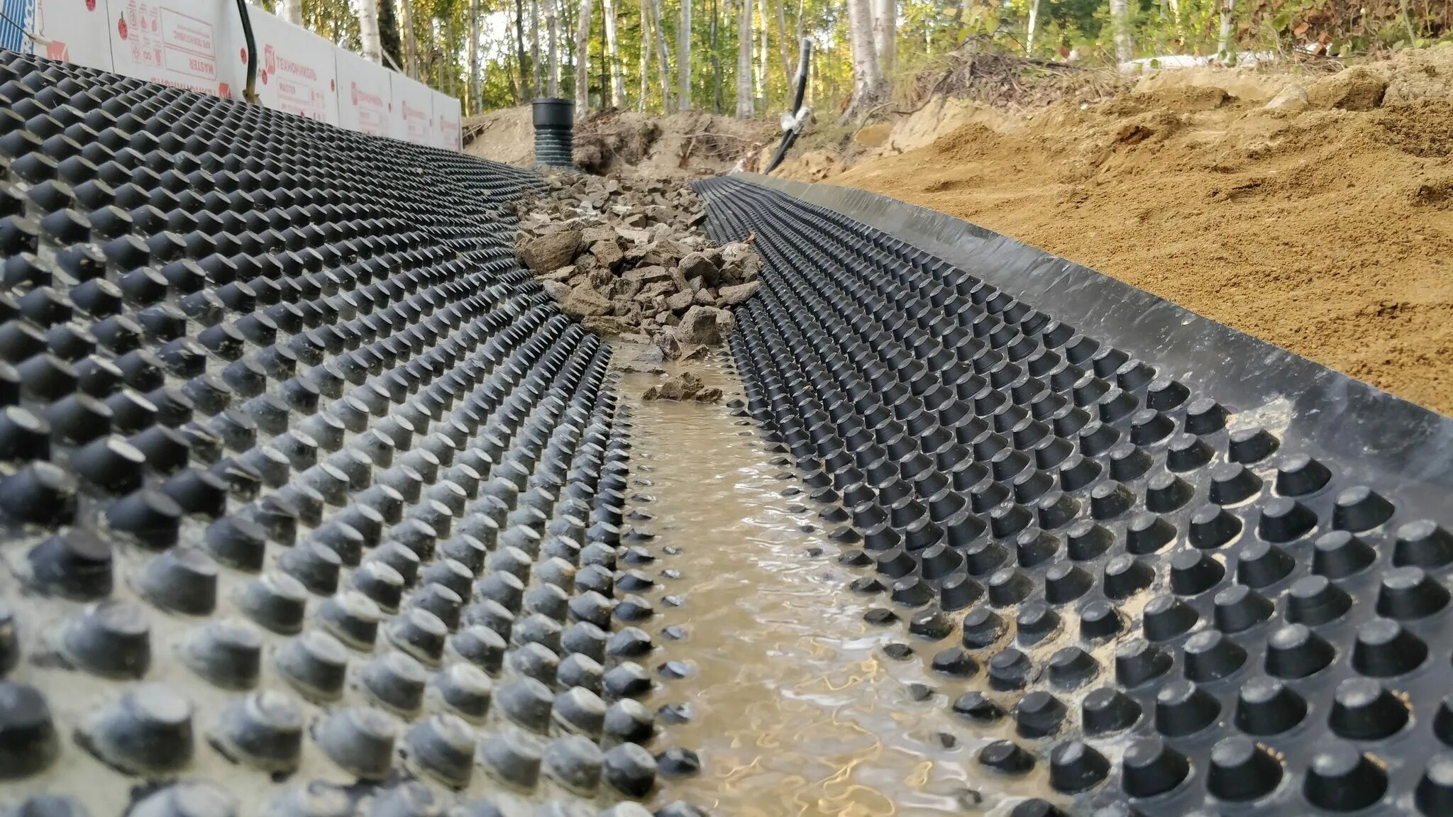 Gruntflex drenaj профилированная мембрана 2х20. Гидроизоляция отмостки технониколь. Плантер отмостка. Gruntflex drenaj 2м x 20м 40м2 профилированная мембрана. Геотекстиль плантер гео.