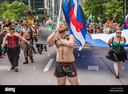 Montreal, CA - 14 August 2016: Member of the BDSM community holding BDSM Fl...