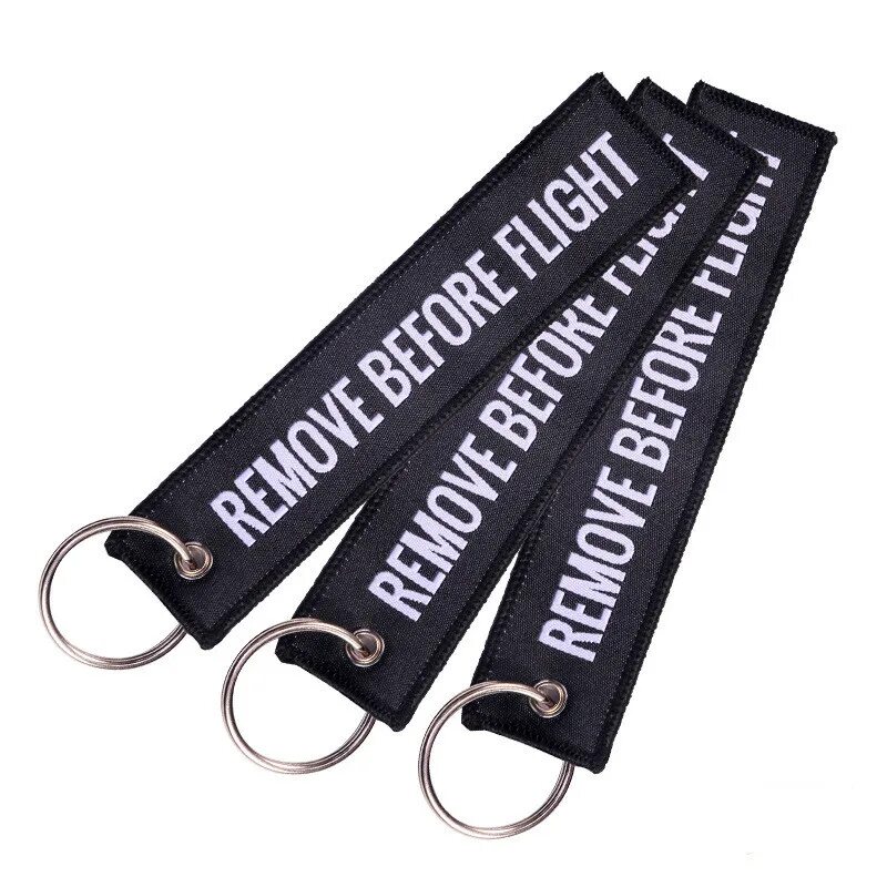 Remove branding. Remove before flight брелок. лента -брелок remove before flight. брелок на молнию. брелок лента для ключей.