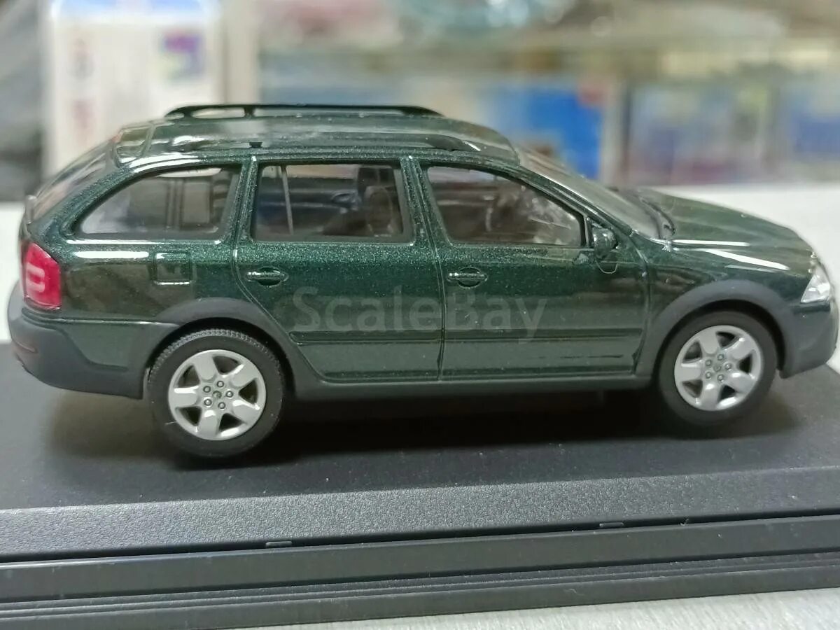 Skoda octavia 1:43. Octavia a7 combi 1:43 коричневый. Škoda octavia a7 модель 1:43. Модель масштабная abrex skoda octavia scout. Модели skoda 1 43.