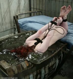Slideshow bdsm water tank.