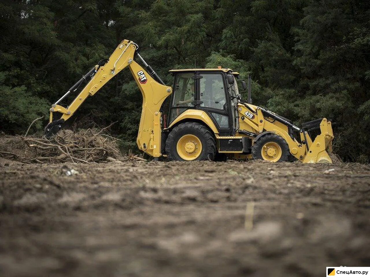 Cat 428. Экскаватор катерпиллер 428 2015.