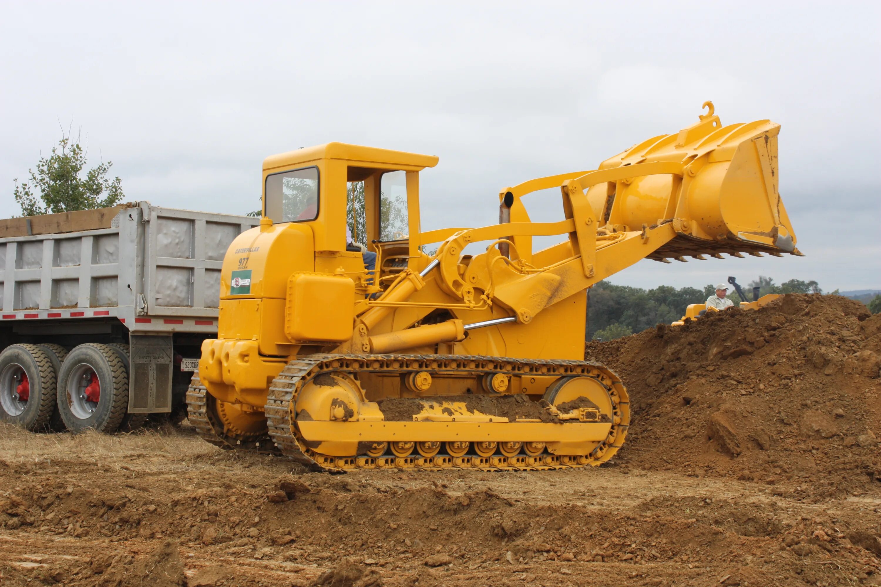 Бульдозер John Deere 850,к. Caterpillar 977. Classic Caterpillar Bulldozer. Землеройная машина ПЗМ-2.