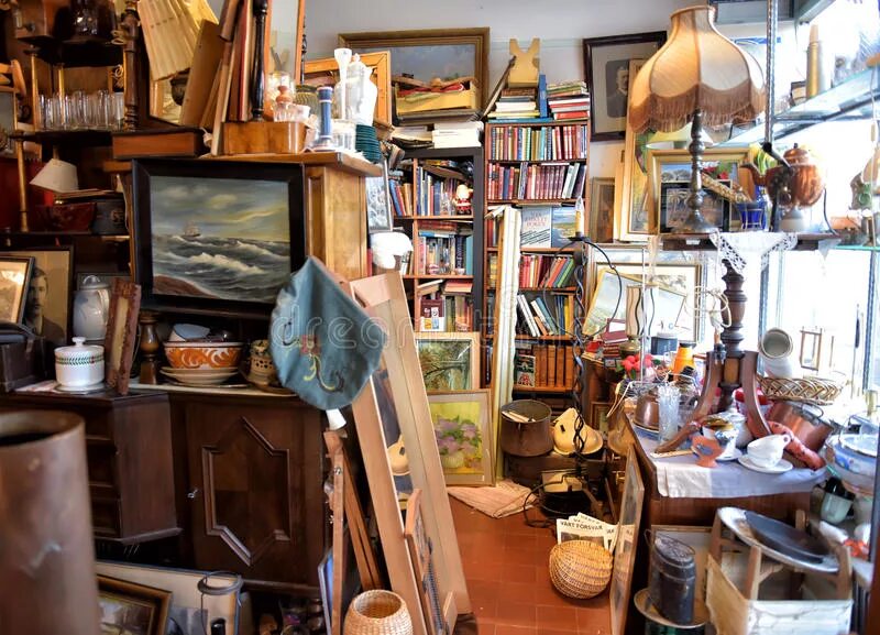 There s a lot of things. Junk shop. Flat with a lot of things. A lot of stuff. Picture with a lot of things.