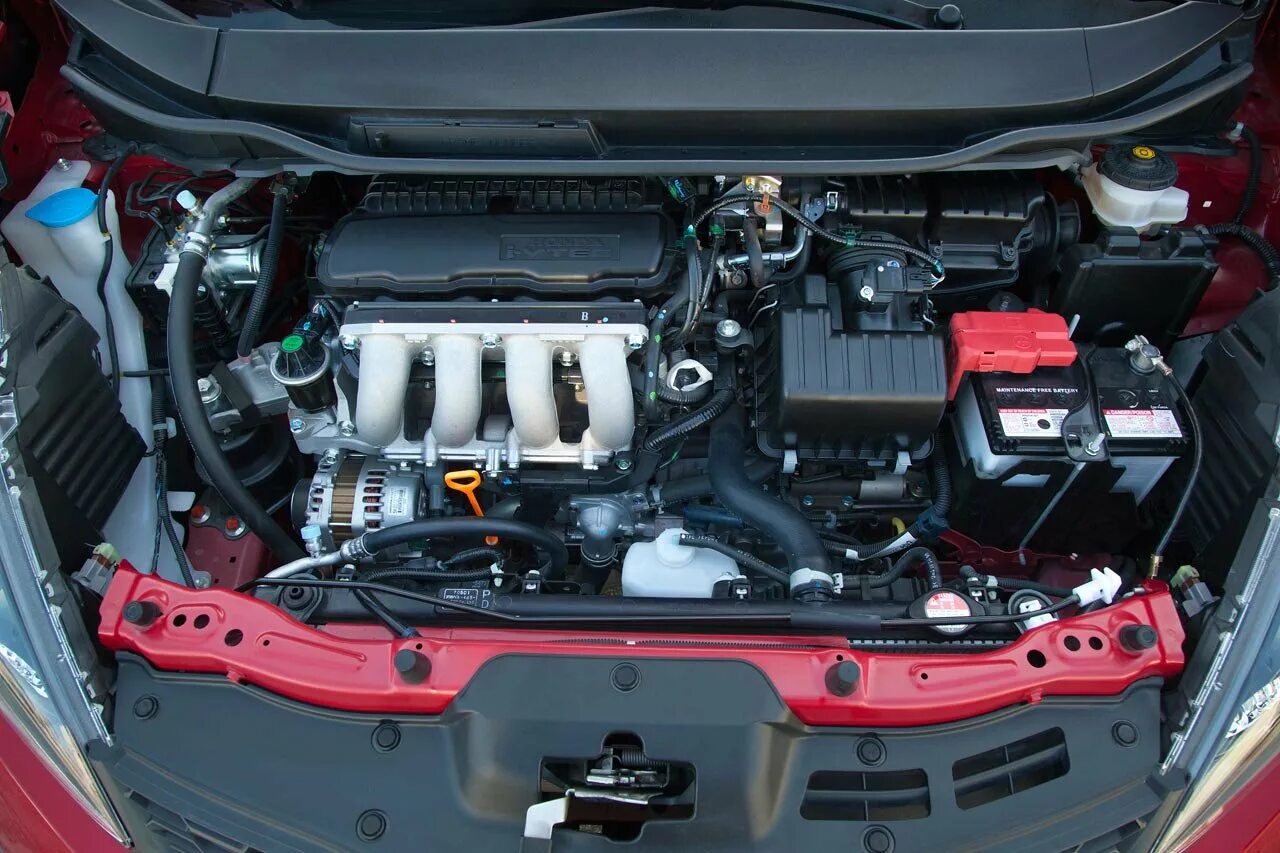 Honda Fit 2012 1.5 гибридный. Honda Fit Hybrid 2011 Battery. Honda Fit 2012 двигатель. Хонда фит гибрид 2012.