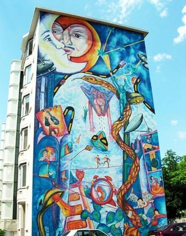 Муралы германии. Разрисованные дома в северодвинске. Живопись на стенах домов. Стрит арт на кирпичной стене. Граффити стрит арт муралы.