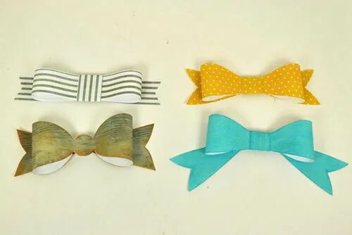 Техника плоский бант увеличение. Плоский бант. Бантик из бумаги. Бантик из бумажной ленты. Бант из ленточки бумажной.