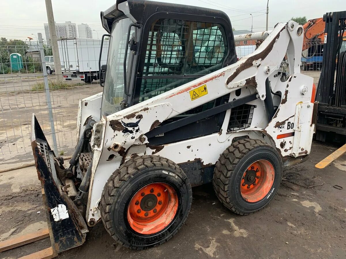 Купить бобкэт бу. Бобкэт s570. Мини-погрузчик Bobcat s570. Bobcat 570. Bobcat s175.