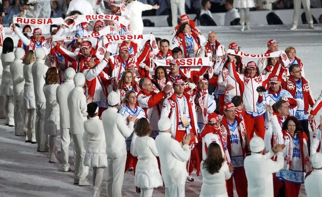 Спортсмены защищают честь. Российские спортсмены на Олимпийских играх. Россия на Олимпиаде в Ванкувере. Россия на зимних Олимпийских играх 2010. Зимние Олимпийские игры российские спортсмены.