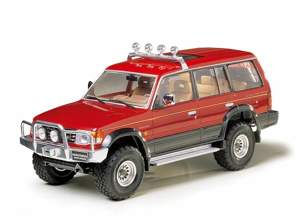 Куплю модель 1 24. Митсубиси Паджеро модели. Mitsubishi Pajero Tamiya. Tamiya Mitsubishi. Mitsubishi Pajero 1.