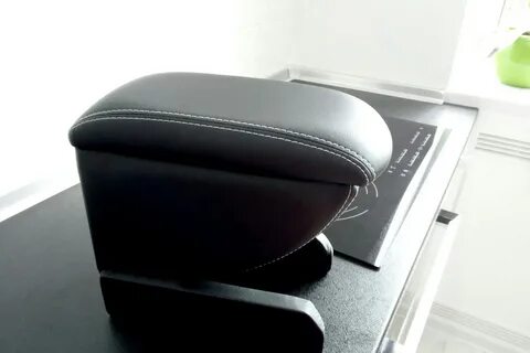 Подлокотник skoda rapid