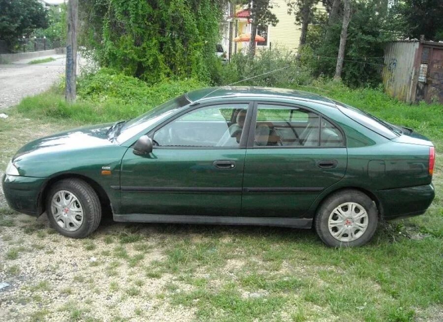 Carisma Mitsubishi 2003 лифтбек. Мицубиси Каризма 1998 1.6. Митсубиси Каризма 2001 1.8. Mitsubishi Carisma 1.8 МТ, 1998. Купить на каризму 1.6