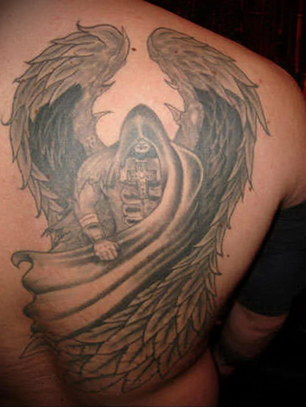 Тату хранитель для мужчин. Татуировки ангелов. Татуировки ангела хранителя для мужчин. Тату ангел хранитель. Тату ангел на плече.