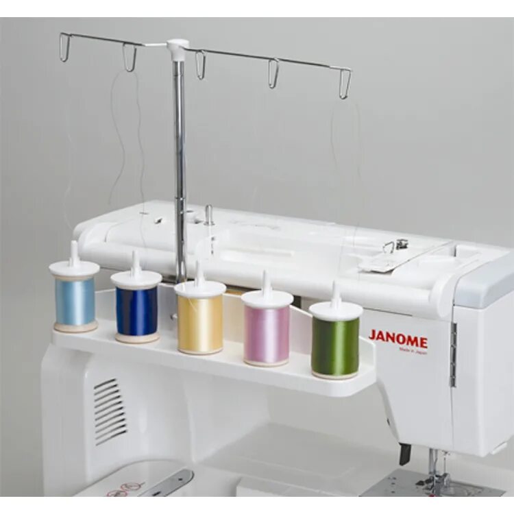 Катушка для швейной машинки. Janome Memory Craft 550e. Многоцветник Janome 832-420-014. Вышивальная машина Janome Memory Craft 500e. Швейная машинка Janome Memory Craft 500e.