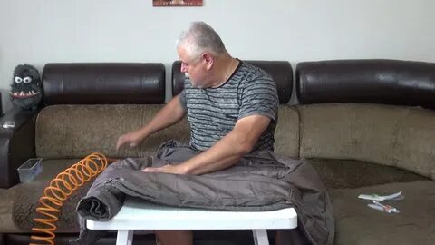 Как расправить пух в пуховике после