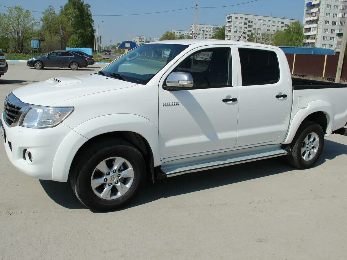 Тойота хайлюкс бу купить в россии. Toyota Hilux 2014. Toyota Hilux, 2014 г.в.. Тойота Хайлюкс пикап 2014 года. Hilux 2014 белый.