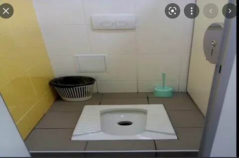 Унитаз в полу для общественных