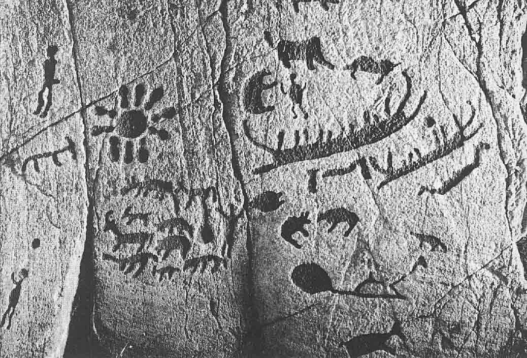 Сказать древний. Древние наскальные письмена. Письменность древних людей наскальные рисунки. Наскальные письмена древнего человека. Древние письмена на камнях.