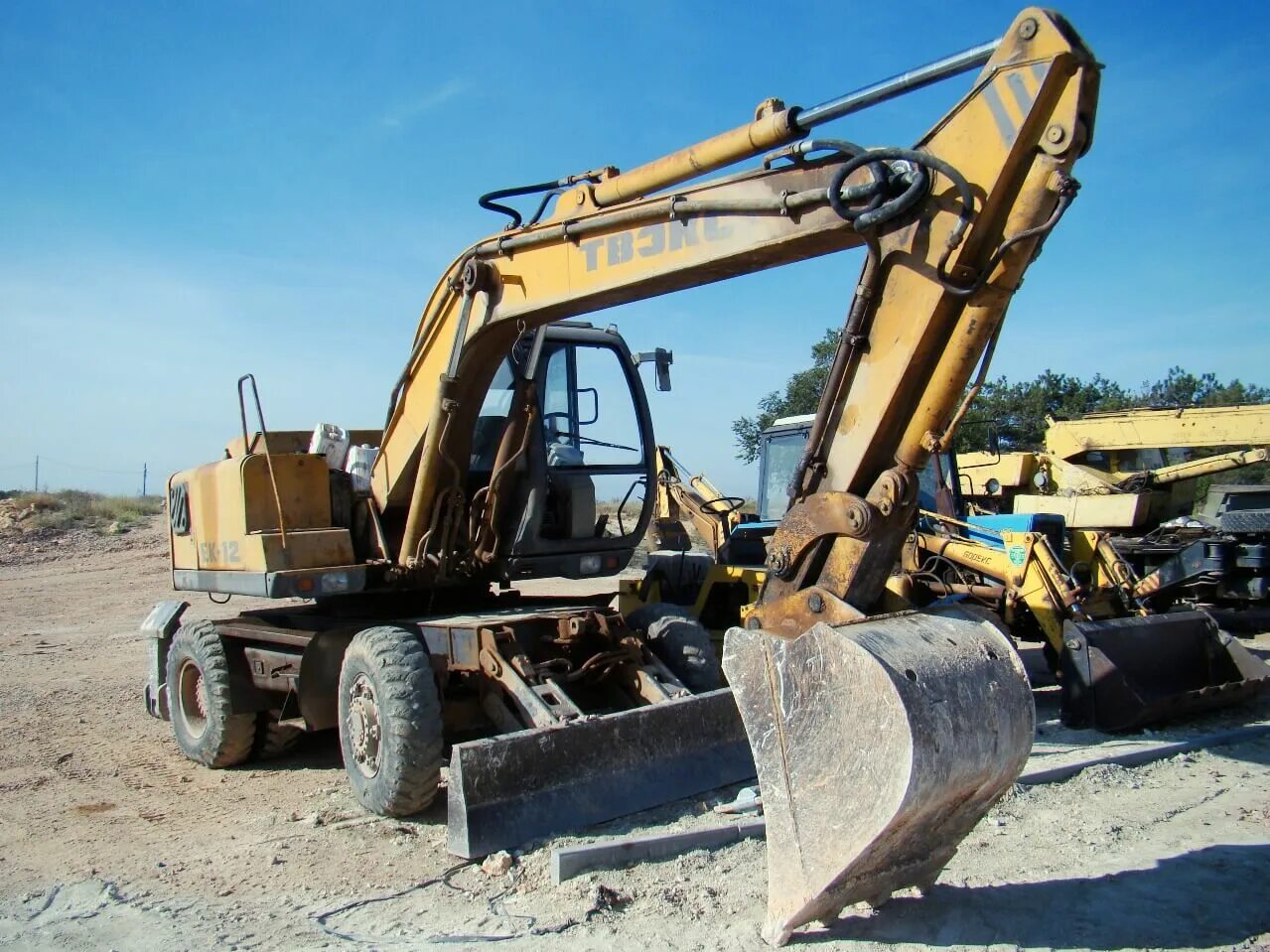 Экскаваторе 12. Ек-12-40. Колесный экскаватор твэкс-12. Экскаватор ек-12-00. Ек 1200 экскаватор.