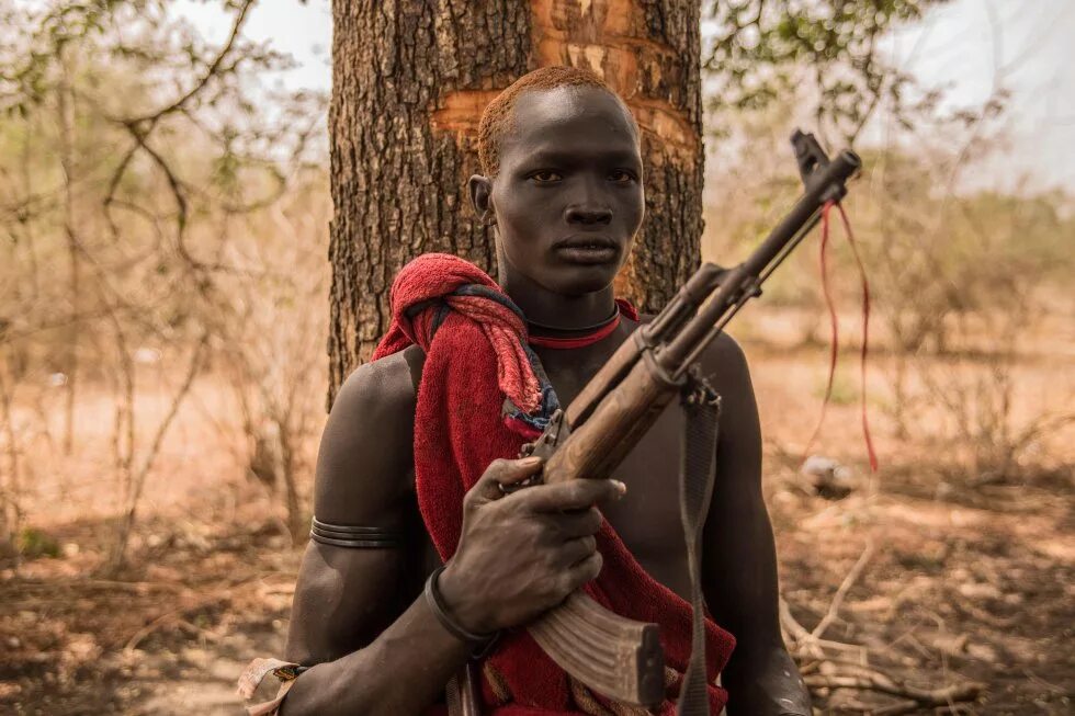 Мужчина женщина в племени. Племя НУБА Судан. Женщины племени НУБА Судан. Мурси, Масаи, бушмены, Химба. Африканское племя НУБА.