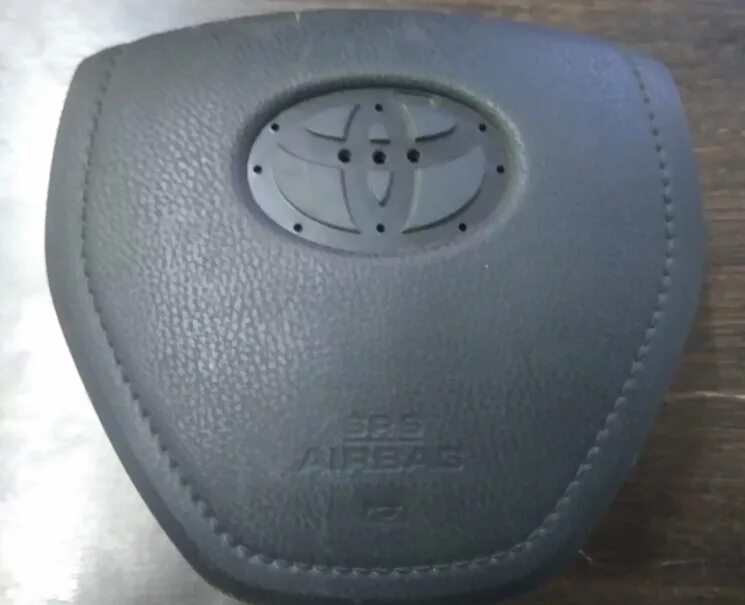 Купить крышку руля. Крышка руля airbag Тигго 8. Toyota RAV 4 2020 крышка руля подушка. Накладка аэрбег руля Тойота рав 4 2004 года. Крышка рулевого колеса rx300.