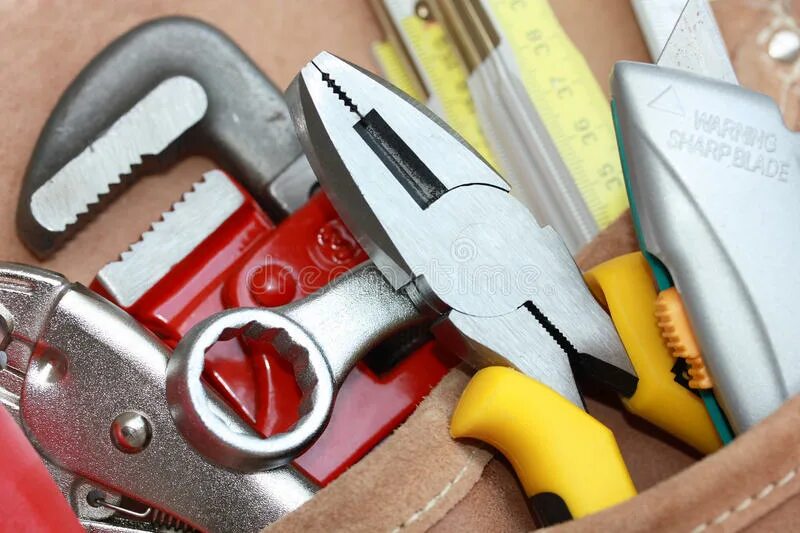 Working tool. Works инструмент. пассатижи в руке. горячая который работает инструменты. work tools.