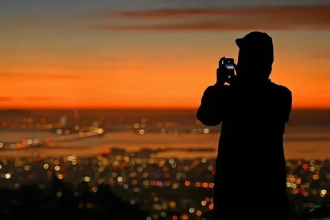 Кто поет песню фотографирую закат будто пару