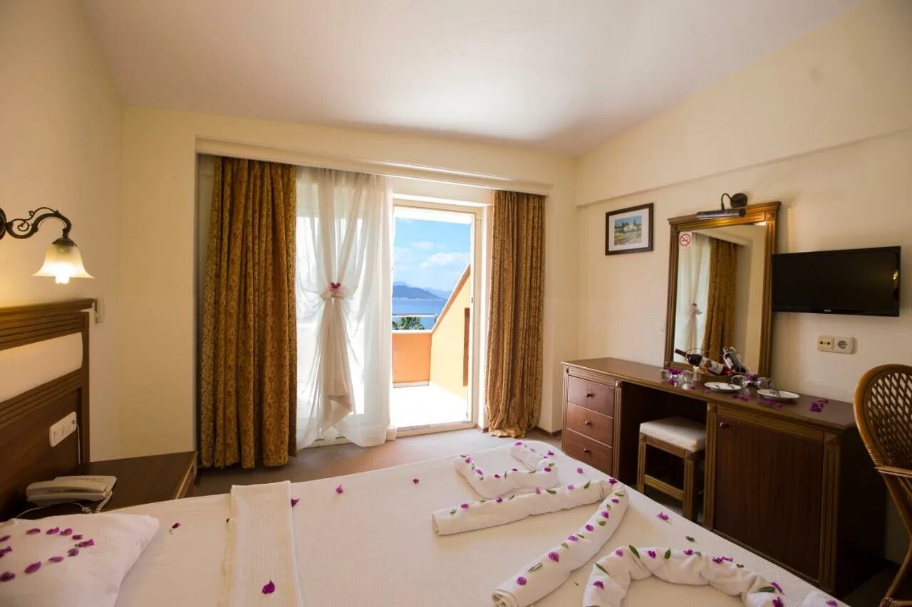 Букинг кемер турция. Отель valeri кемер. valeri beach hotel 4 турция кемер. ланкора бич кемер турция. park marina 3 турция кемер.
