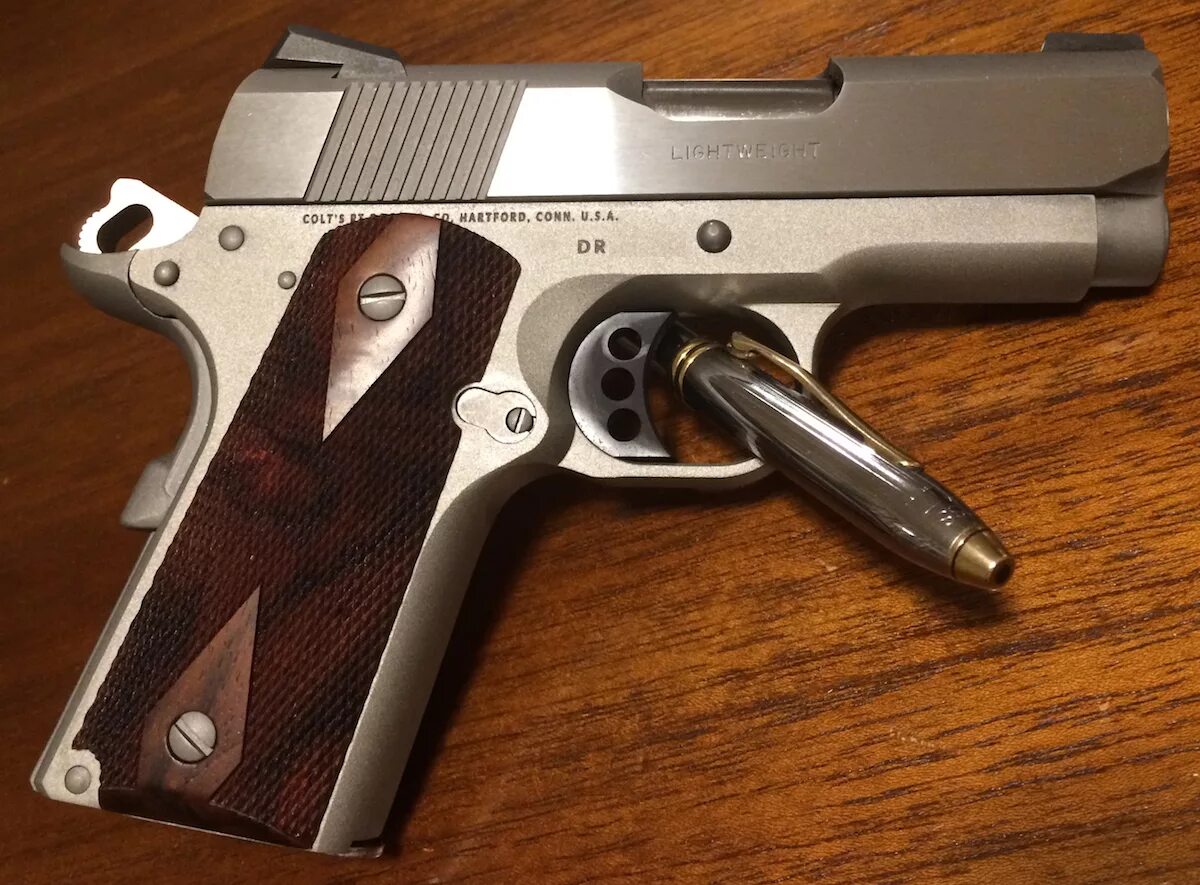 Defender 45. Кольт Дефендер 45 калибра. Colt Defender 45 ACP. Short Barrel 1911. Colt Lightning.