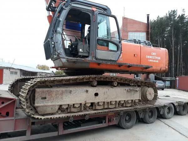 Каток на экскаватор. Hitachi zx230. Хитачи ZX 230. Гусеничный экскаватор Hitachi ZX 230. Каток экскаватор zx200  Хитачи.