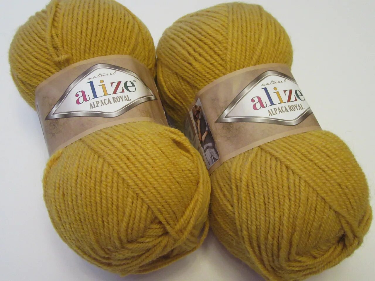 Альпака роял. Пряжа alize alpaca royal 02. пряжа alize alpaca royal. альпака роял 02 ализе рояль. alpaca royal 02 шафран.