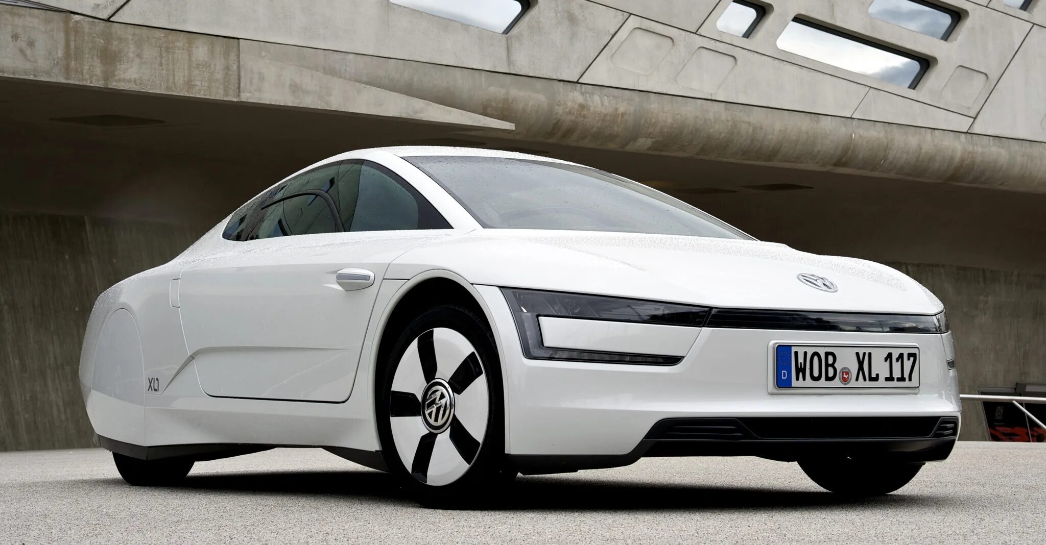 Автомобили длиной 6 метров. Volkswagen xl1. Volkswagen xl1 (2013). Фольксваген гибрид xl1. Фольксваген XL.