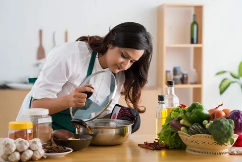 She is in the kitchen