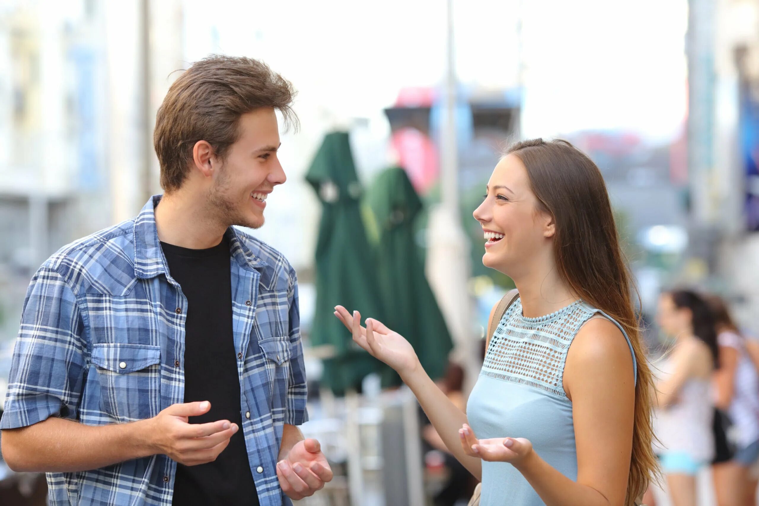 Friend&#039;s meeting. Meeting friends. people two on the street. talking in the street. 2 friends talking in pisa.