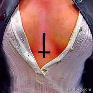 inverted cross tattoo - photo for article 01122021 4.