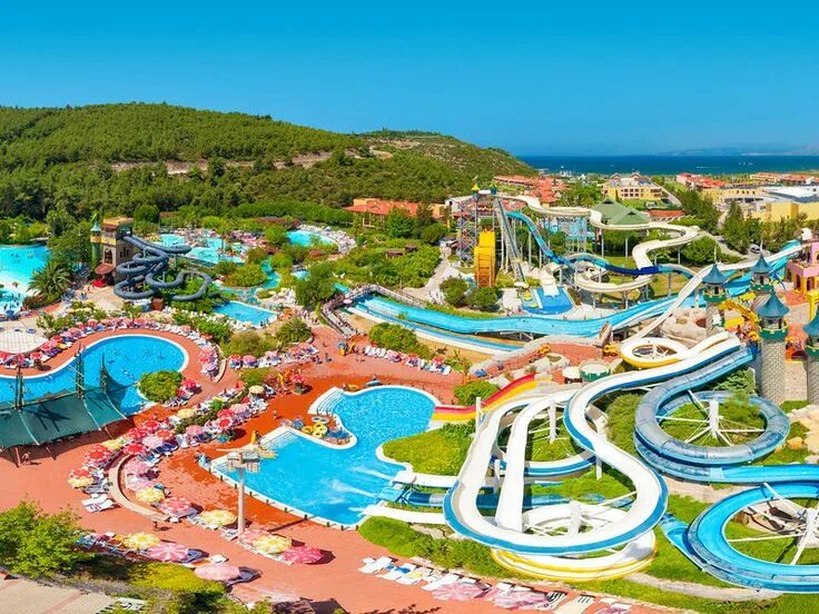Какие аквапарки в турции. Aqua fantasy aquapark 5 кушадасы. aqua fantasy aquapark hotel spa. отели турции с аквапарком. aqua fantasy турция.