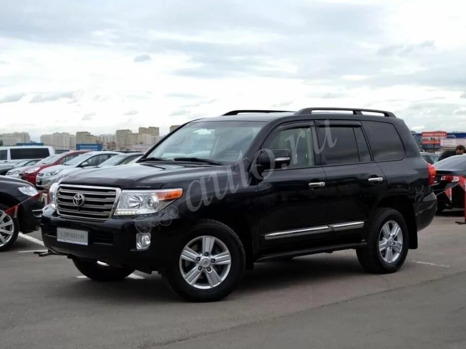 Крузер 200 2012 год. Land Cruiser 200 2012 черный. Toyota Land Cruiser 200 2012 Black. Тойота ленд Крузер 200 2012 Рестайлинг. Тойота Лэнд Крузер 2012 черный.