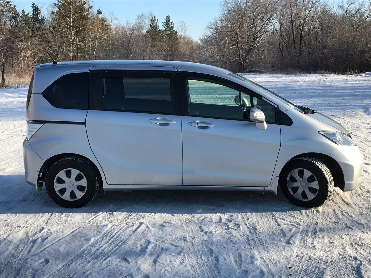 Фрид 2012 года гибрид. Honda freed. Хонда Фрид 2 поколение. Хонда Фрид 4 ВД. Honda freed 2012.