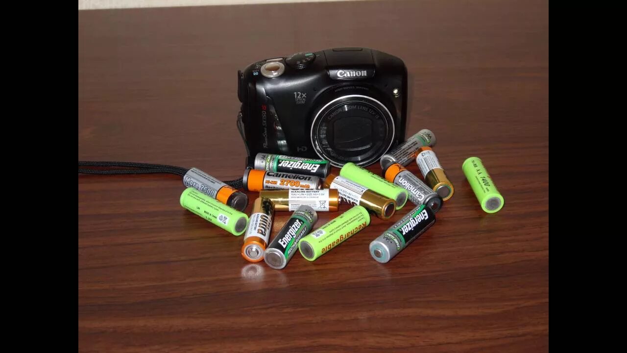Какие батарейки для фотоаппарата. Батарейки для фотоаппарата canon powershot. батарейки к фотоаппарату canon pc1562. батарейка для пленочного фотоаппарата canon. зеркалка canon пальчиковых батареек.