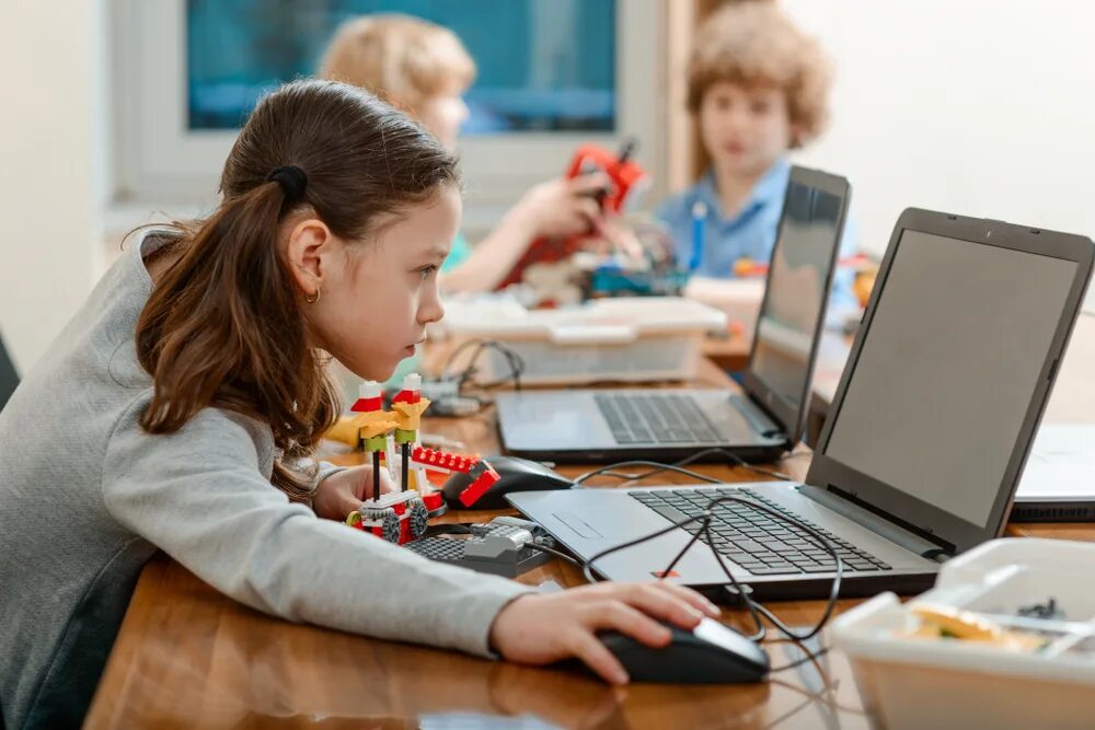 Children playing are computer