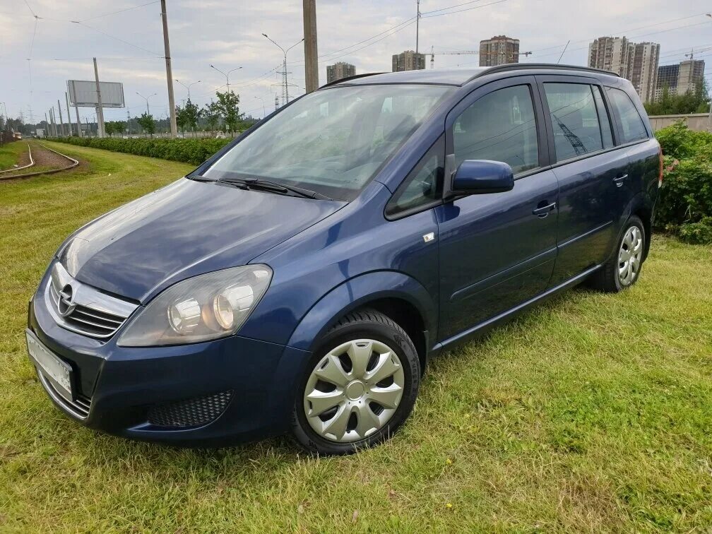 Опель Зафира синяя 2008. Опель Зафира b Рестайлинг. Opel Zafira 1.8 МТ, 2008 Cosmo. Опель Зафира в Рестайлинг.